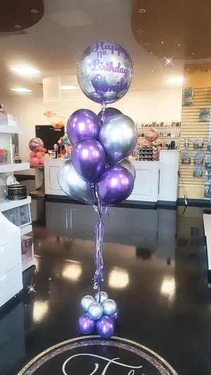 Purple birthday balloons